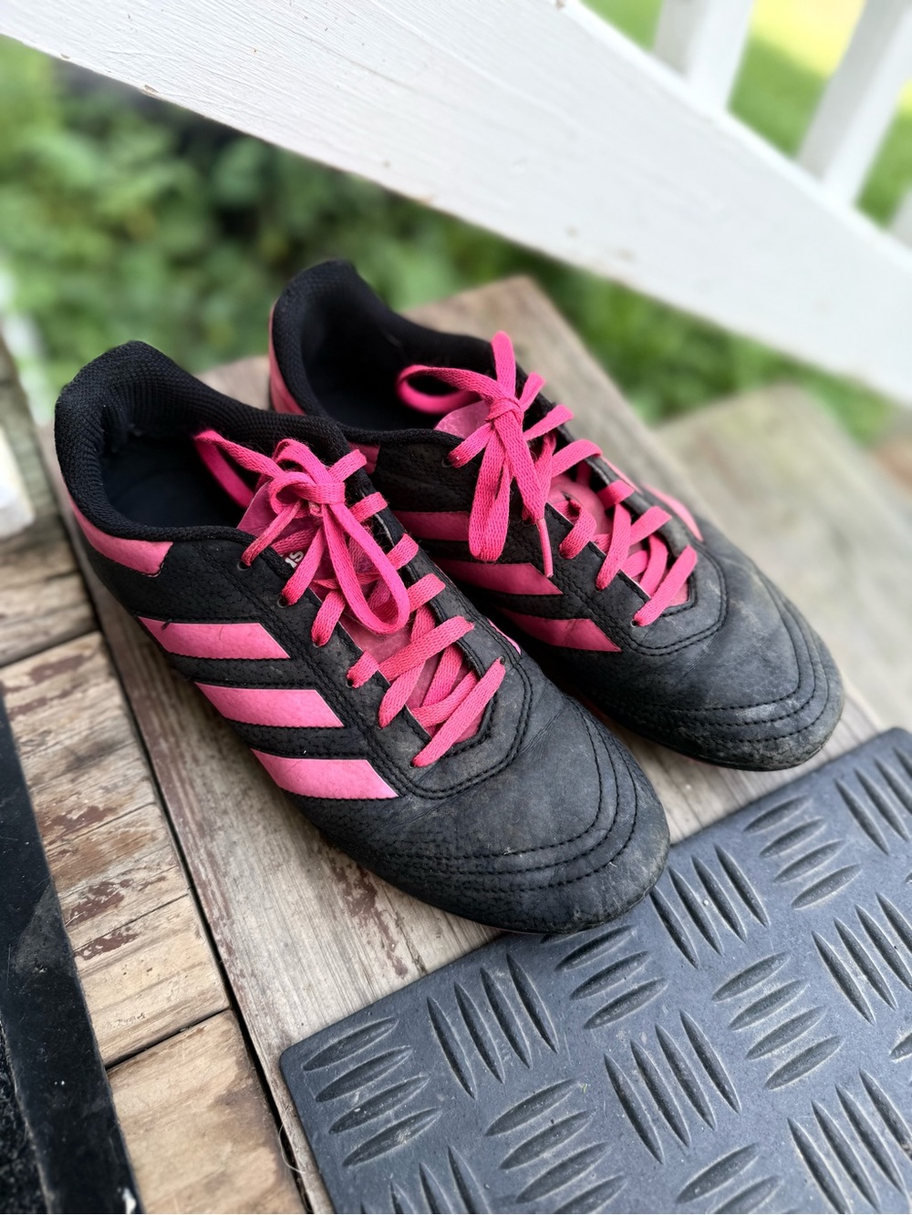 adidas Kids Black cleats with Pink Stripes and Laces